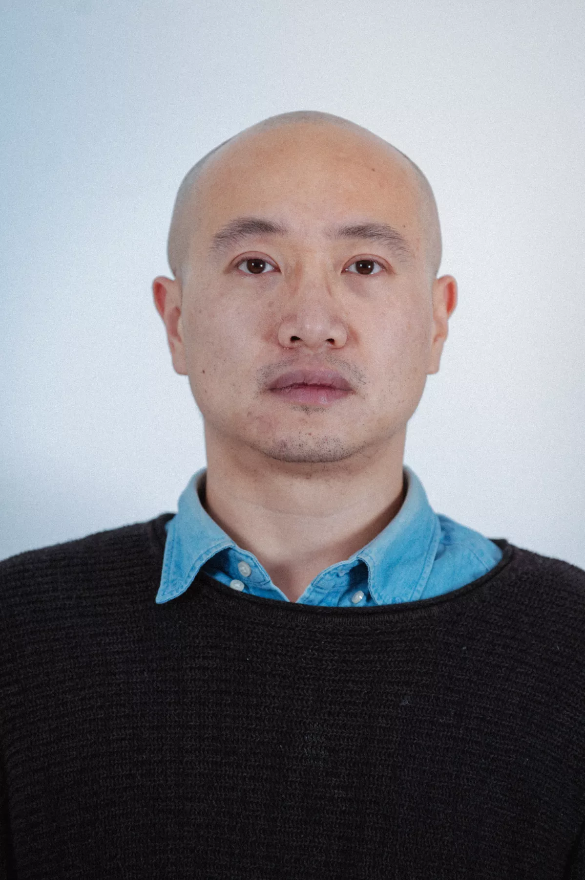 Ein Porträt von Dingding Jiang