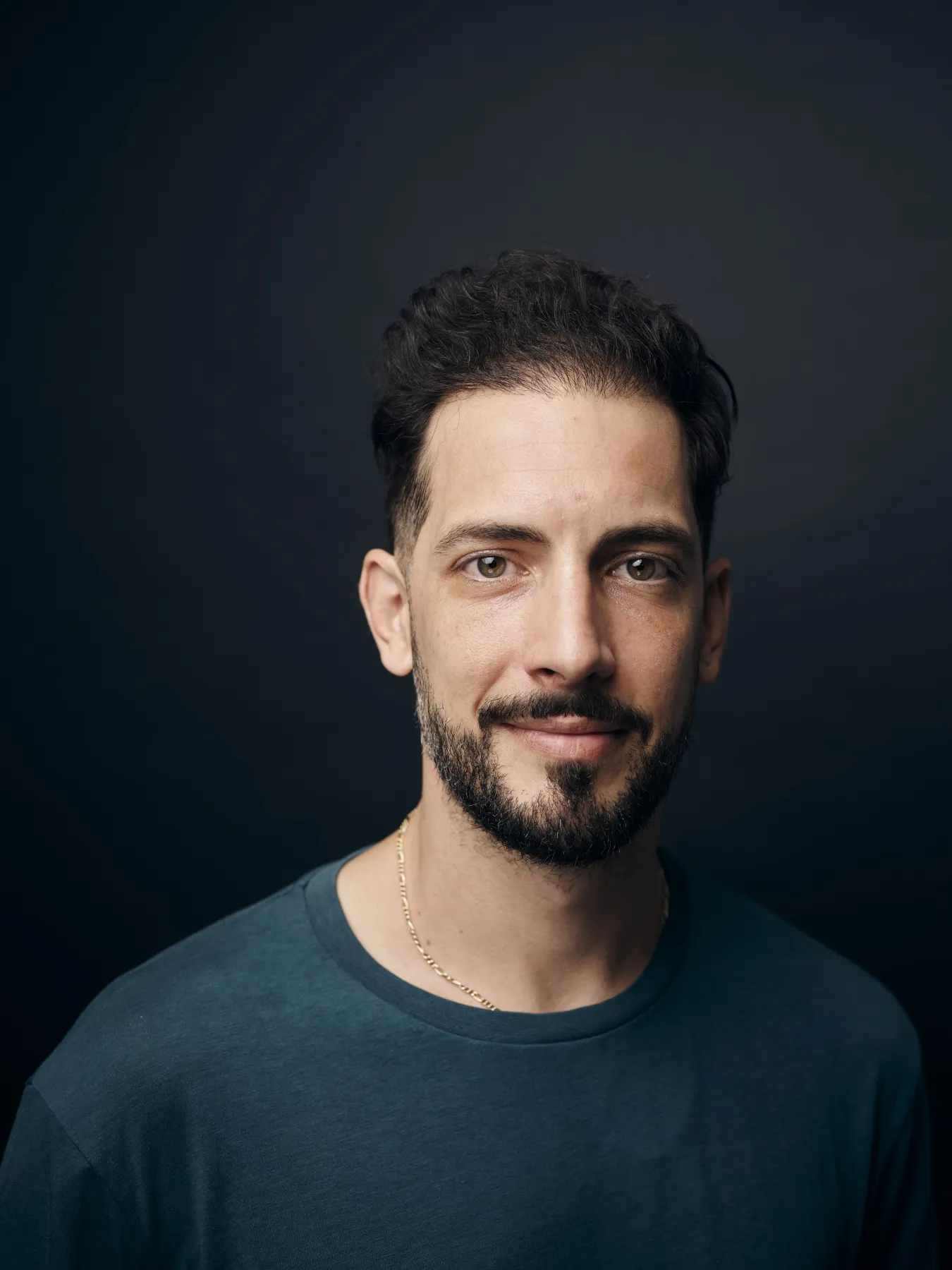 Ein Porträt von Ozan Mermer